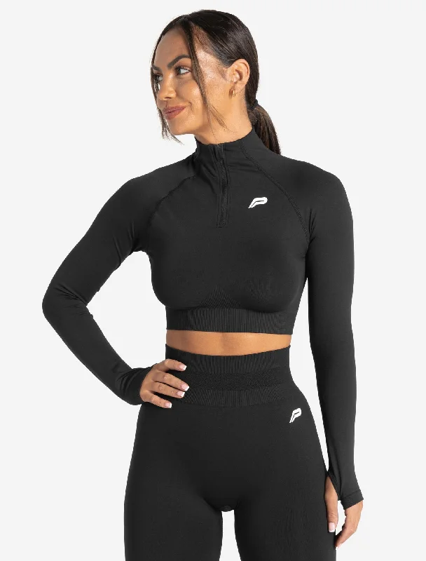 Backless Women's Crop Top in Black for a Sensual and Alluring Evening OutfitScrunch Seamless Crop 1/2 Zip - Black Backless Women's Crop Top in Black for a Sensual and Alluring Evening OutfitScrunch Seamless Crop 1/2 Zip - Black