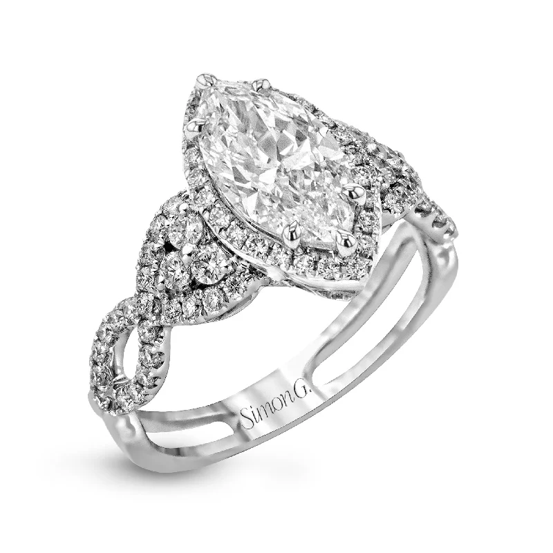 Cathedral - Style Engagement Rings with a Raised Center Stone and Intricate MetalworkMarquise-Cut Halo Engagement Ring In 18k Gold With Diamonds